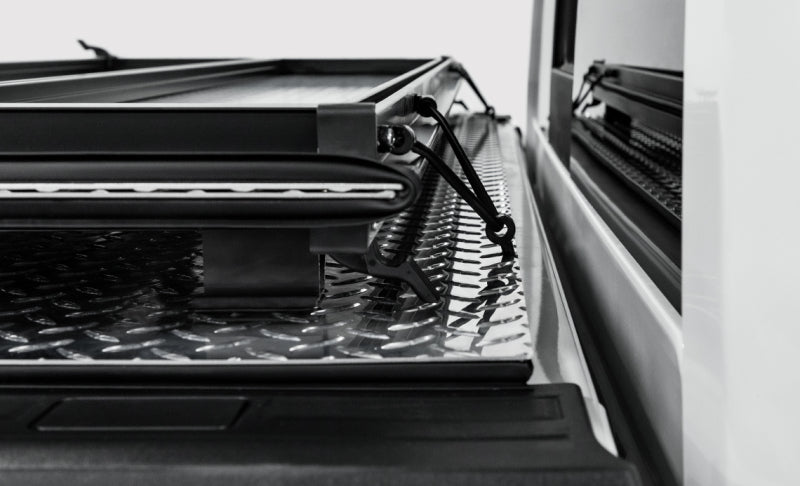 Access 2022+ Rivian R1T 4ft 6in Bed (w/ OEM Tonneau Track) LOMAX Folding Hard Cover - Black Urethane