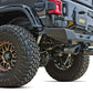 Gibson 12-17 Jeep Wrangler Sport 3.6L 2.5in Patriot Skull Series Cat-Back Dual Exhaust - Blk Ceramic