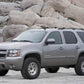 Fabtech 07-14 GM C/K1500 SUV 2WD/4WD 4in Budget UCA System w/DL 2.5 Coilovers & Rear DL Shocks